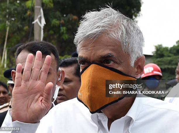 Sri Lanka's Prime Minister Ranil Wickremesinghe visits the site of a massive garbage mountain collapse in the Meethotamulla suburb of Colombo on...
