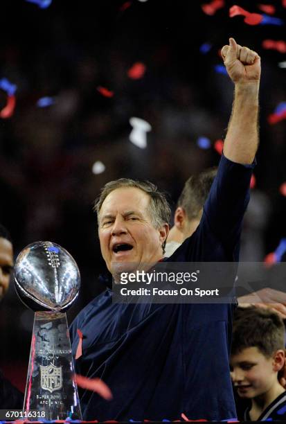 Head coach Bill Belichick of the New England Patriots celebrates with the Vince Lombardi trophy after the Patriots defeat the Atlanta Falcons 34-28...