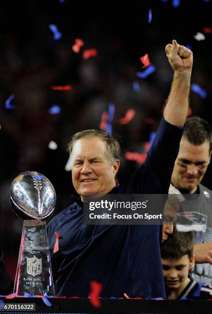 Head coach Bill Belichick of the New England Patriots celebrates with the Vince Lombardi trophy after the Patriots defeat the Atlanta Falcons 34-28...