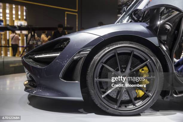 The wheel of a McLaren Automotive Ltd. 720S luxury automobile is seen at the Auto Shanghai 2017 vehicle show in Shanghai, China, on Wednesday, April...