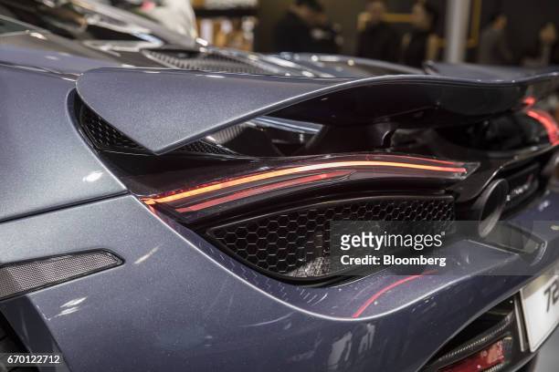 The tail lights of a McLaren Automotive Ltd. 720S luxury automobile is seen at the Auto Shanghai 2017 vehicle show in Shanghai, China, on Wednesday,...