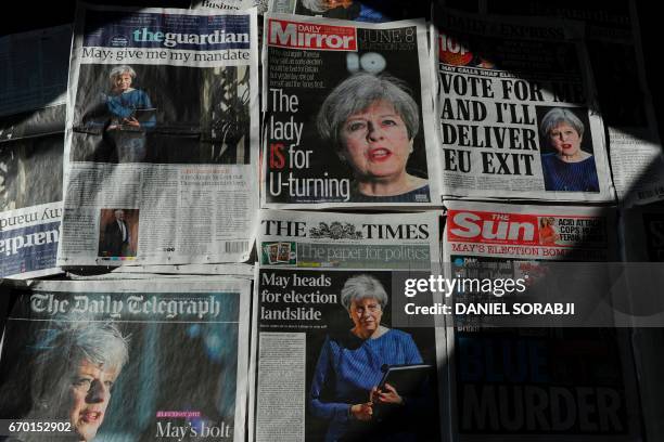 An arrangement of newspapers pictured in London on April 19 as an illustration, shows the front pages of the UK daily newspapers reporting on British...