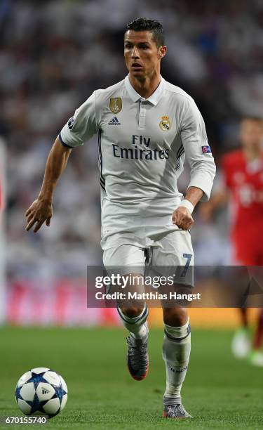 Cristiano Ronaldo of Real Madrid controls the ball during the UEFA Champions League Quarter Final second leg match between Real Madrid CF and FC...