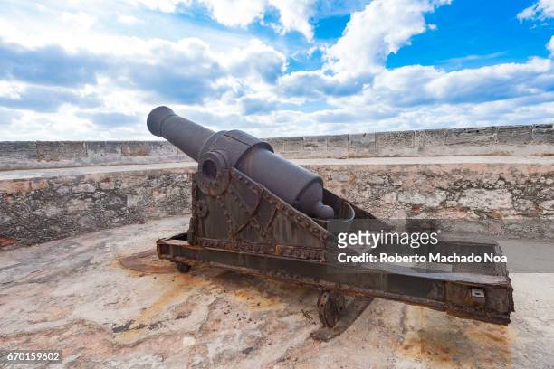 Old vintage colonial cannon at 'El Morro' Spanish fortress. Morro Castle , named after the three biblical Magi, is a fortress guarding the entrance...