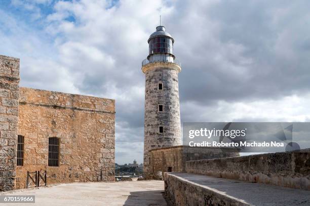 Lighthouse tower at 'El Morro' and old colonial walls of the colonial military fortress. Morro Castle , named after the three biblical Magi, is a...