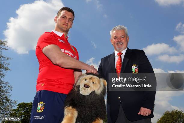 Sam Warburton and Warren Gatland shake hands during the British and Irish Lions tour squad announcement at the Hilton London Syon Park Hotel on April...