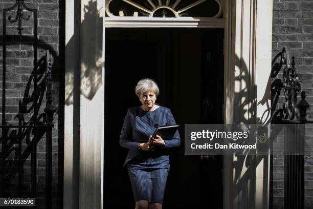 Prime Minister Theresa May arrives to make a statement to the nation in Downing Street on April 18, 2017 in London, United Kingdom. The Prime...