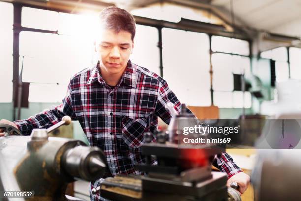 man working in production - milling cutter stock pictures, royalty-free photos & images