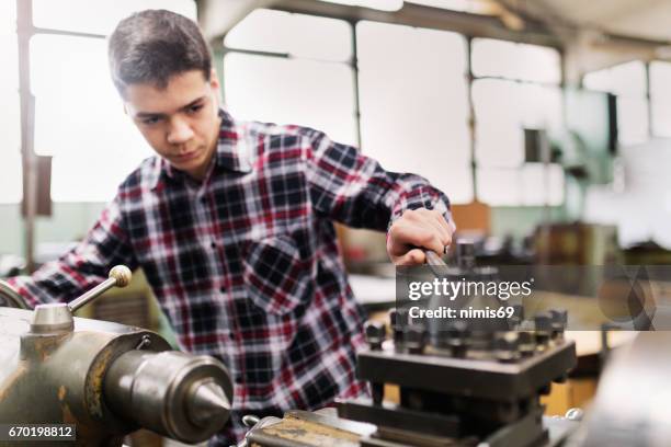 man working in production - milling cutter stock pictures, royalty-free photos & images
