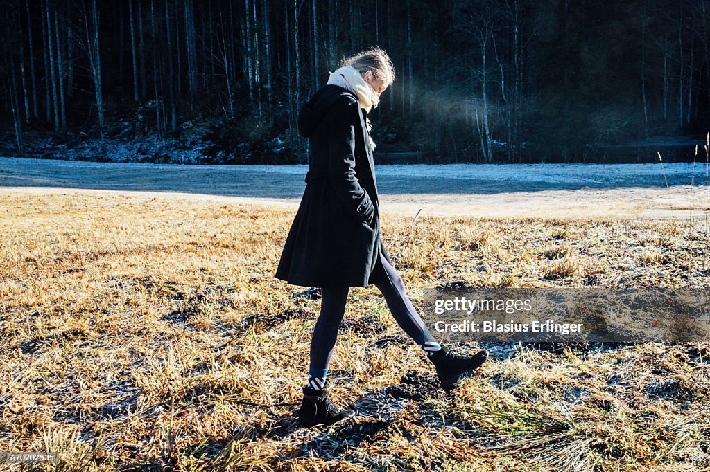 Girl walks around in winter