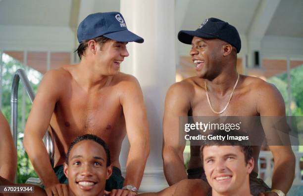 Liverpool player Jamie Redknapp shares a joke with Aston Villa striker Dalian Atkinson as Manchester United player Paul Ince and Gary Speed of Leeds...