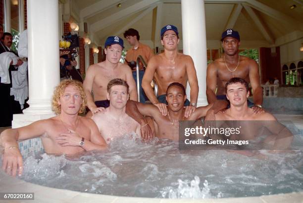 Back row left to right, Nick Barmby, Jamie Redknapp, Dalian Atkinson, front row Ray Parlour, Chris Waddle, Paul Ince and Gary Speed pose in a Hot Tub...