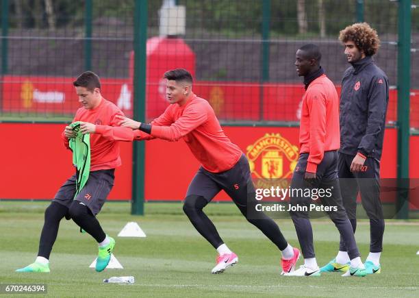 Ander Herrera, Marcos Rojo, Eric Bailly and Marouane Fellaini of Manchester United in action during a first team training session at Aon Training...