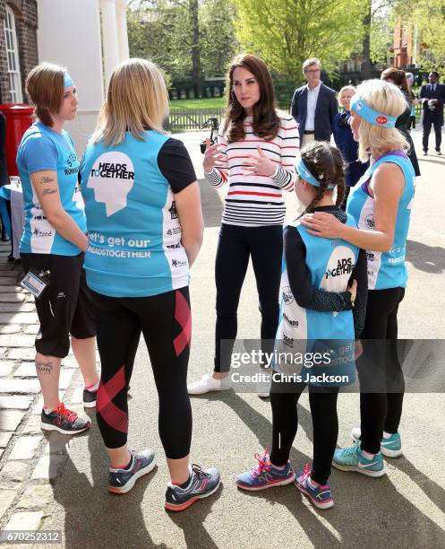 Catherine, Duchess of Cambridge speaks with runners from Team Heads Together ahead of the 2017 Virgin Money London Marathon, at Kensington Palace on...