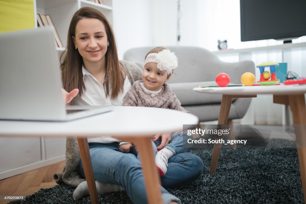 Baby and mother at home