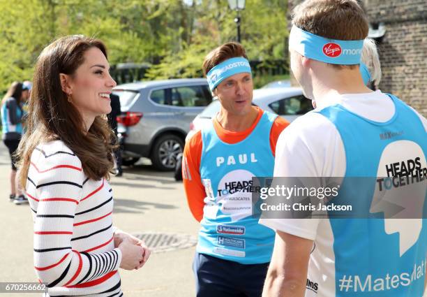 Catherine, Duchess of Cambridge speaks with runners from Team Heads Together ahead of the 2017 Virgin Money London Marathon, at Kensington Palace on...