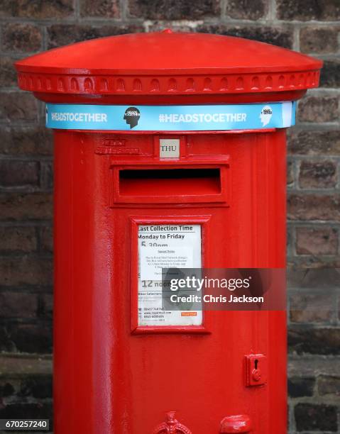 The Heads Together headband on the Kensington Palace post-box, placed there by Catherine, Duchess of Cambridge in support of the Royal Mail wrapping...