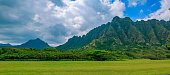 Panorama of the mountain range by famous Kualoa Ranch in Oahu, Hawaii where  