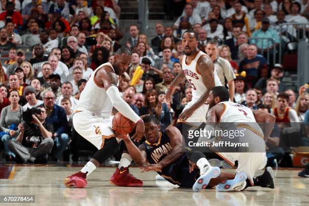 LeBron James of the Cleveland Cavaliers attempts to steal the ball from Lavoy Allen of the Indiana Pacers in Round One of the Eastern Conference...