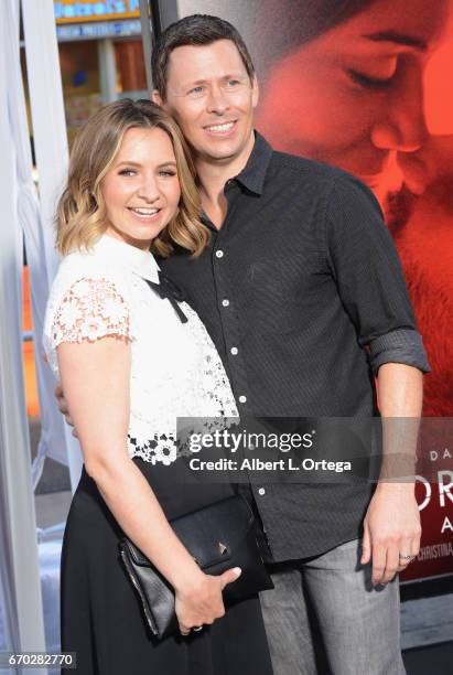 Actress Beverley Mitchell and Michael Cameron arrive for the Premiere Of Warner Bros. Pictures' "Unforgettable" held at TCL Chinese Theatre on April...