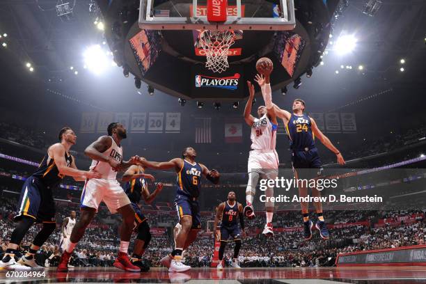 Paul Pierce of the LA Clippers drives to the basket around Jeff Withey of the Utah Jazz during Game Two of the Western Conference Quarterfinals of...