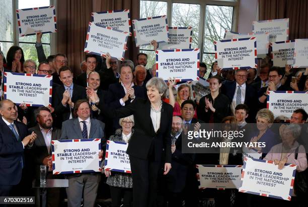 Britain's Prime Minister Theresa May delivers a speech to Conservative Party members as they launch their election campaign in Walmsley Parish Hall...