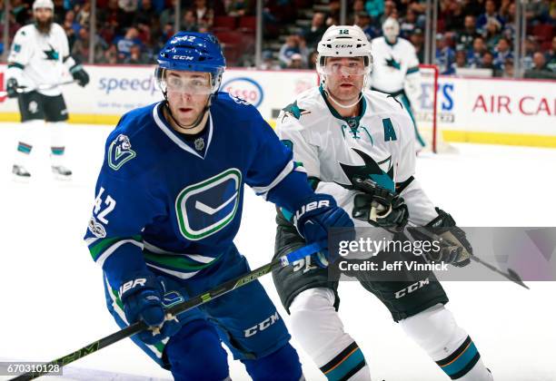 April 2: Drew Shore of the Vancouver Canucks and Patrick Marleau of the San Jose Sharks skate up ice during their NHL game at Rogers Arena April 2,...