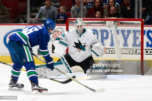 April 2: Martin Jones of the San Jose Sharks watches a Jayson Megna of the Vancouver Canucks lines up a shot during their NHL game at Rogers Arena...