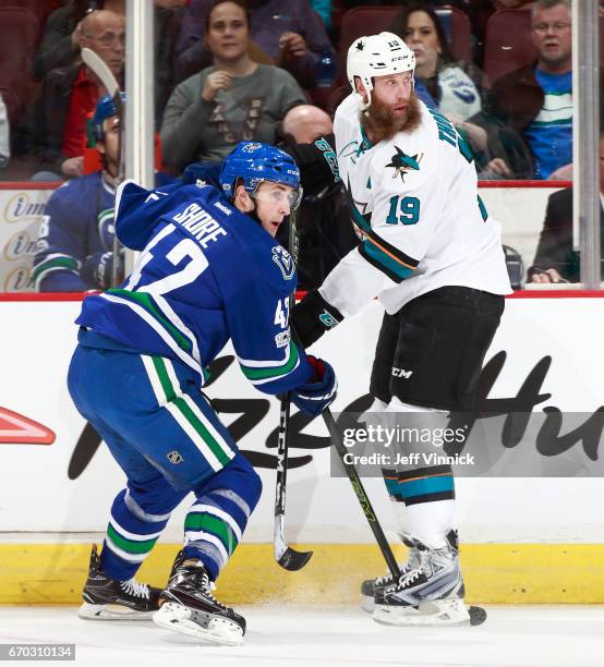 April 2: Drew Shore of the Vancouver Canucks and Joe Thornton of the San Jose Sharks watch the play during their NHL game at Rogers Arena April 2,...