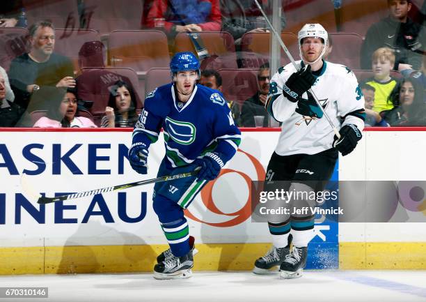 April 2: Jayson Megna of the Vancouver Canucks and Jannik Hansen of the San Jose Sharks skate up ice during their NHL game at Rogers Arena April 2,...