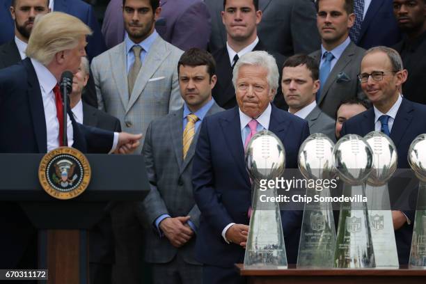 New England Patriots owner Robert Kraft is congratulated by U.S. President Donald Trump during an event celebrating the team's Super Bowl win on the...
