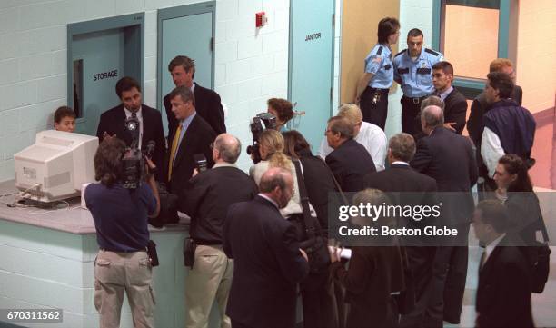 Acting Governor Paul Cellucci is shown the computer operation of cells from the guard station at Souza-Baranowski Correctional Center, a maximum...