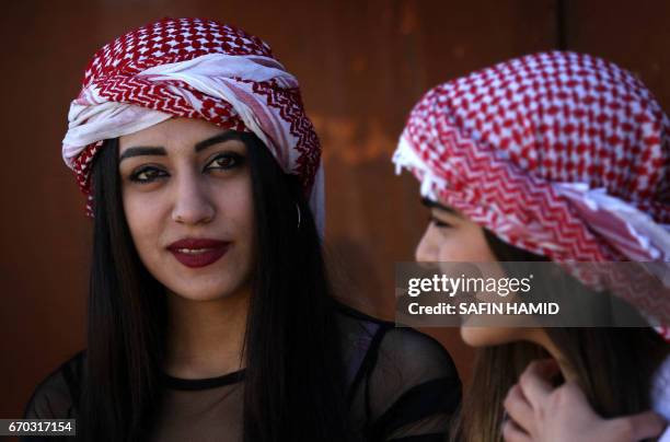 Iraqi Christian girls attend a ceremony celebrating the Yazidi New Year on April 19 in the town of Bashiqa, some 20 kilometres north east of Mosul.