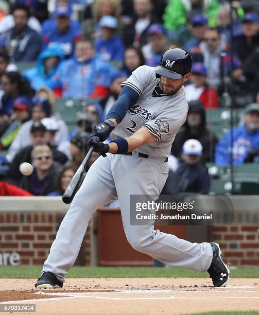 Travis Shaw of the Milwaukee Brewers hits a two run home run in the 1st inning against the Chicago Cubs at Wrigley Field on April 19, 2017 in...