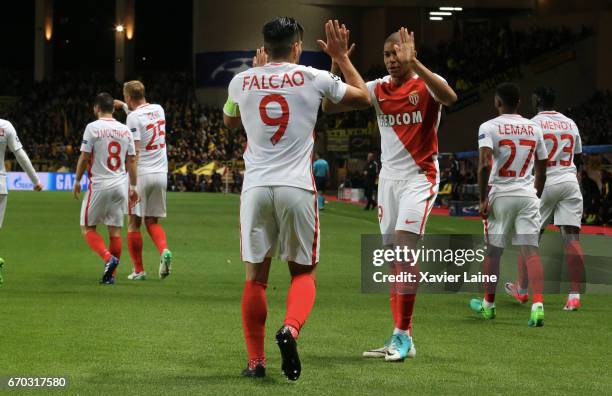 Captain Radamel Falcao of AS Monaco celebrates his goal with Kylian Mbappe during the UEFA Champions League Quarter Final second leg between AS...