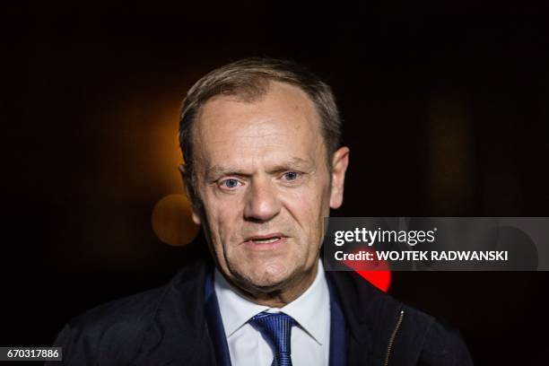 President of the European Council and former Polish Prime Minister Donald Tusk is seen leaving the prosecutor's office where he testified for about...