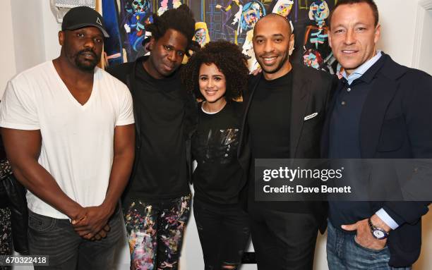 Dereck Chisora, Bradley Theodore, Nathalie Emmanuel, Thierry Henry and John Terry attend a VIP private view for New York artist Bradley Theodore at...
