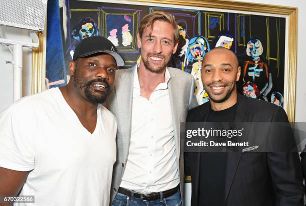 Dereck Chisora, Peter Crouch and Thierry Henry attend a VIP private view for New York artist Bradley Theodore at Maddox Gallery on April 19, 2017 in...