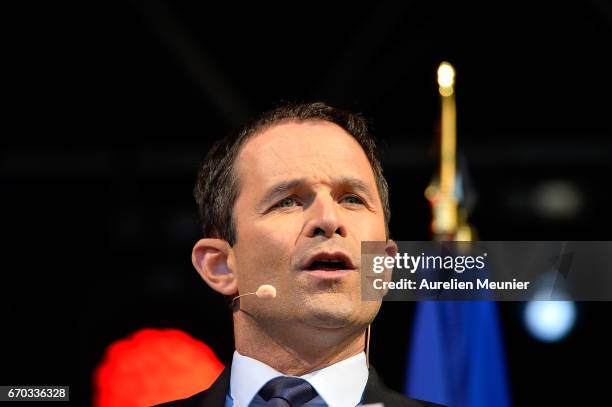 French Socialist Party Presidential candidate Benoit Hamon addresses voters during a political meeting Place de la Republique on April 19, 2017 in...