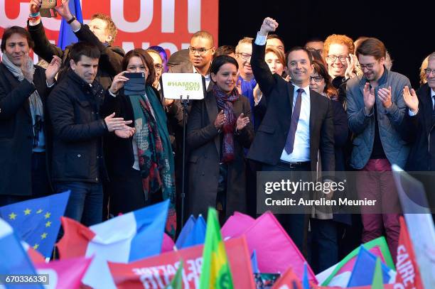 French Socialist Party Presidential candidate Benoit Hamon salutes the crowd after a political meeting Place de la Republique on April 19, 2017 in...