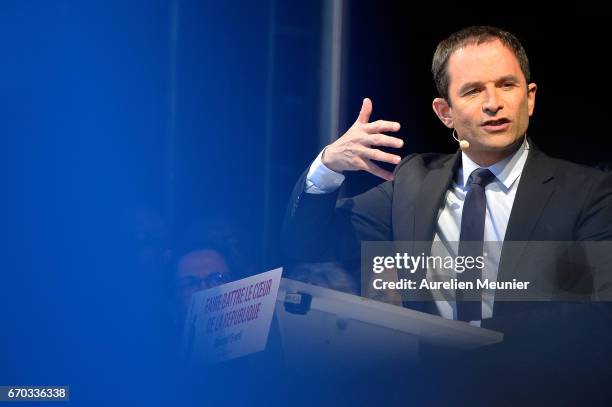 French Socialist Party Presidential candidate Benoit Hamon addresses voters during a political meeting Place de la Republique on April 19, 2017 in...