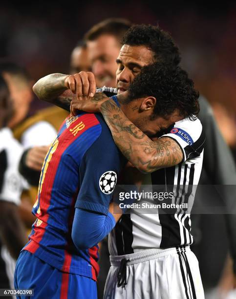 Neymar of Barcelona is embraced by Dani Alves of Juventus after the UEFA Champions League Quarter Final second leg match between FC Barcelona and...