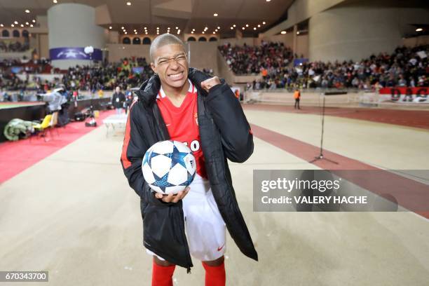 Monaco's French forward Kylian Mbappe Lottin reacts after Monaco defeated Dortmund during the UEFA Champions League 2nd leg quarter-final football...