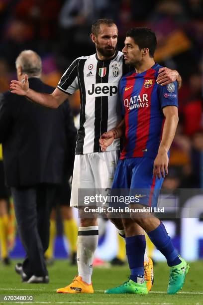 Luis Suarez of FC Barcelona is consoled by Giorgio Chiellini of Juventus at the end of the UEFA Champions League Quarter Final second leg match...