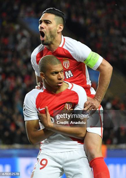 Moncao's Kylian Mbappe celebrates with the team mate Radamel Falcao after scoring a goal during the UEFA Champions League quarter final, second leg...