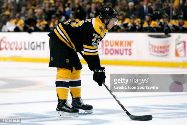 Boston Bruins right defenseman Charlie McAvoy gets set for an offensive zone face off during Game 3 of a first round NHL playoff game between the...