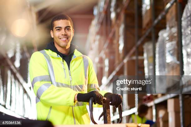 warehouse worker portrait - reflective clothing stock pictures, royalty-free photos & images