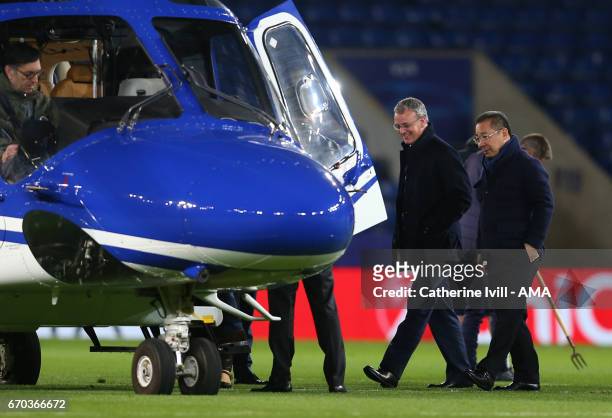 Leicester City owner Vichai Srivaddhanaprabha heads to his helicopter with Director of football Jon Rudkin during the UEFA Champions League Quarter...