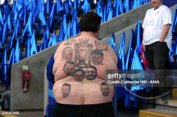 Leicester City fan with tattoos on his back on the Premier League trophy, Claudio Ranieri, Jamie Vardy, Riyad Mahrez and Leicester City players...