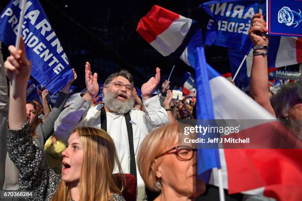 Far right supporters attend a presidential campaign rally by National Front Leader Marine Le Pen at the Dome De Marseille on April 19, 2017 in...